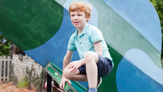 Child in the play area at croome